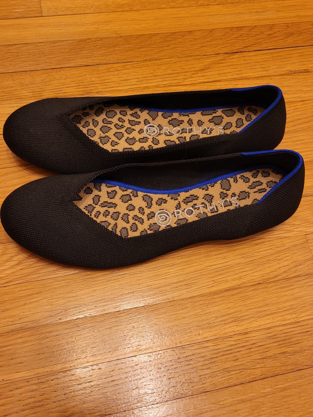 Rothy's Black Knit Flats with Blue Trim